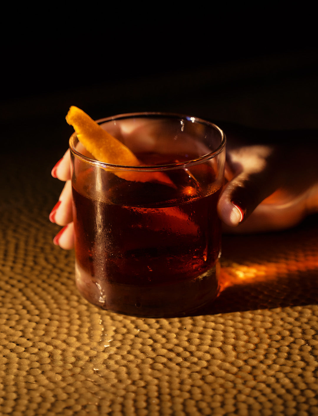 hand holding an 818 negroni