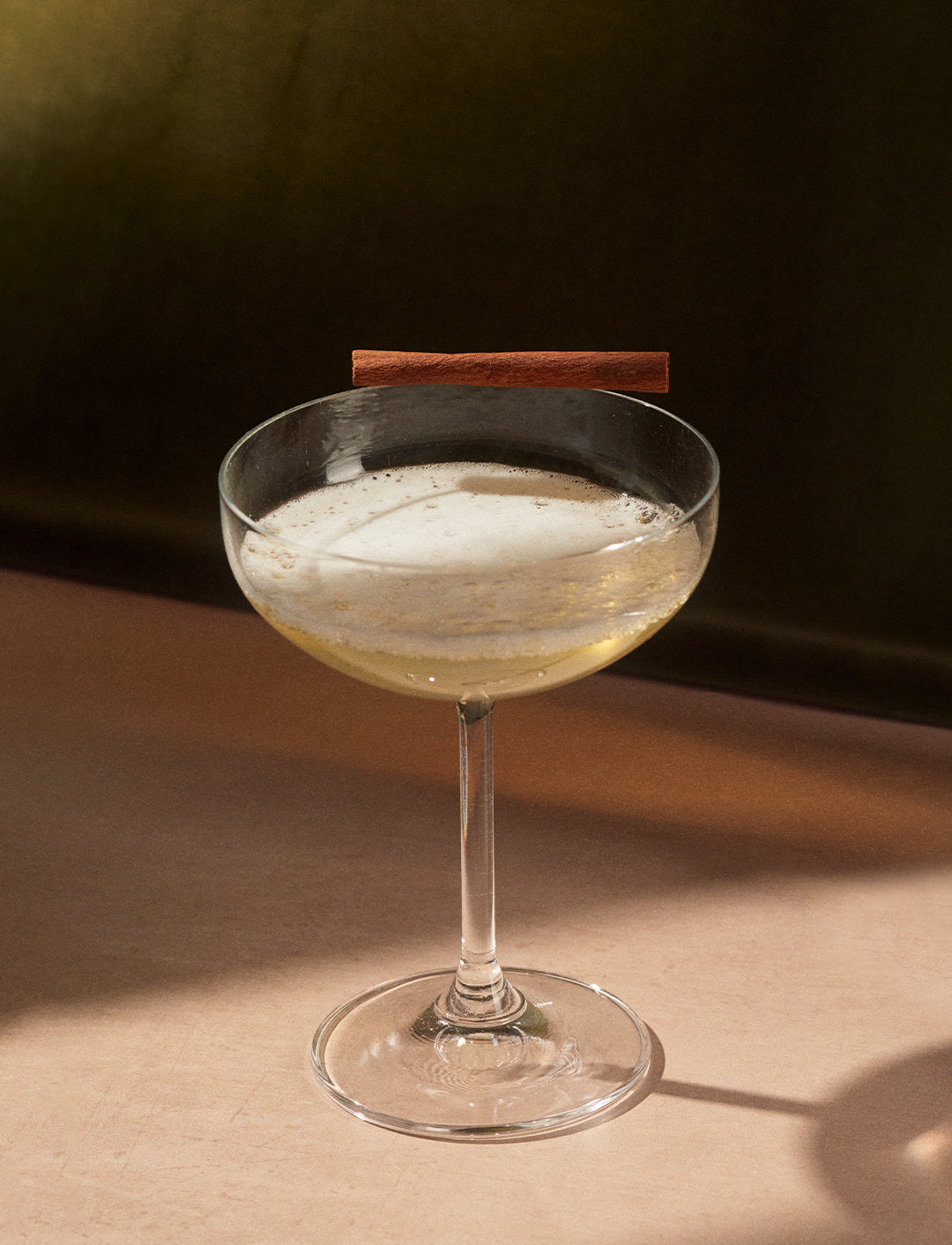 Freshly Baked cocktail with a cinnamon stick garnish